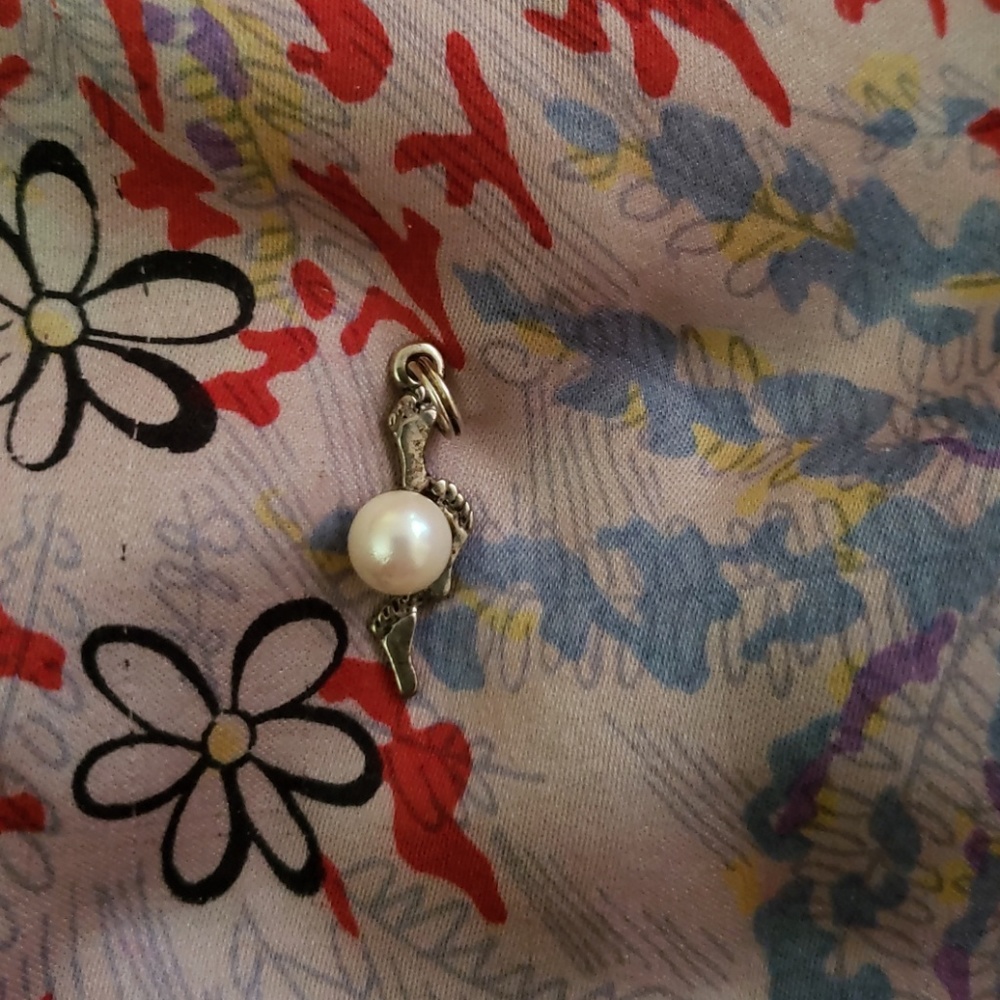 Pearl footsteps charm